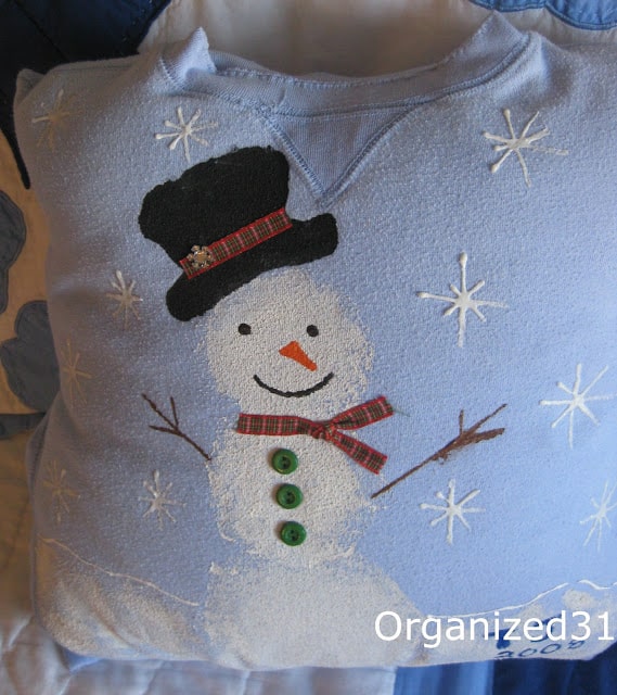 closeup of a snowman pillow made from a child's sweatshirt