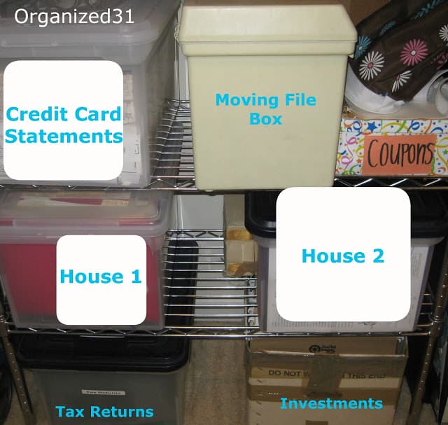 plastic containers with different labels holding documents on metal shelf in closet.