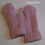 pink mittens with text reading Organized 31
