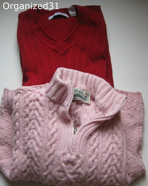 a red sweater and a pink sweater