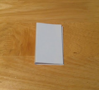 a white piece of paper folded in half