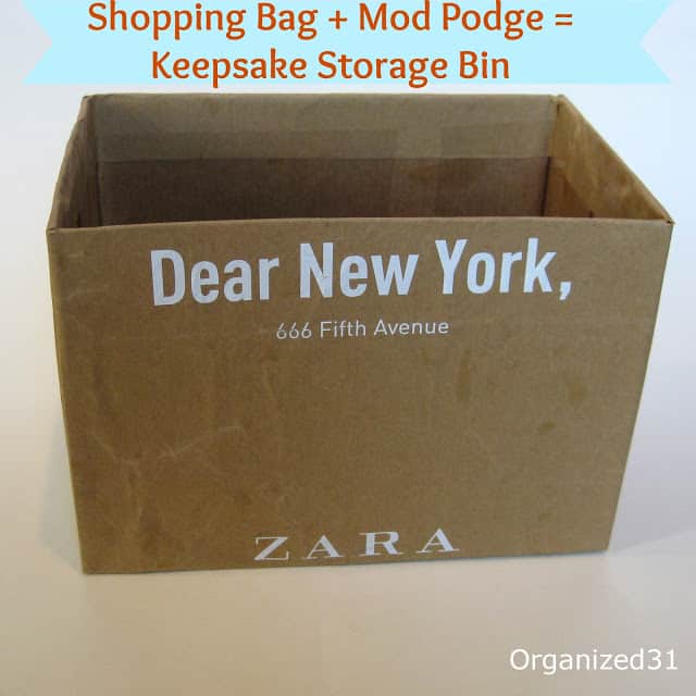a cardboard box with text on it reading Dear New York, 666 Fifth Avenue Zara with title text reading Shopping Bag + Mod Podge = Keepsake Storage Bin