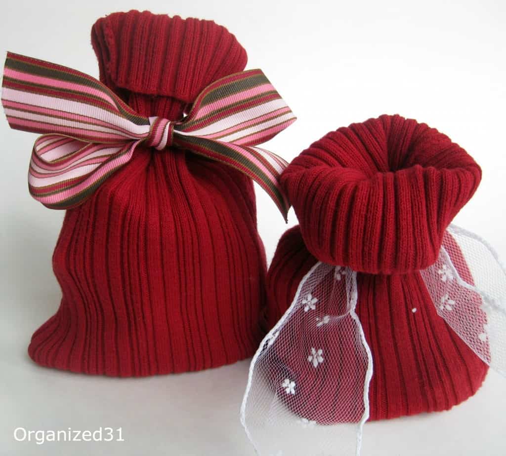 2 red Sweater gift bags with bows