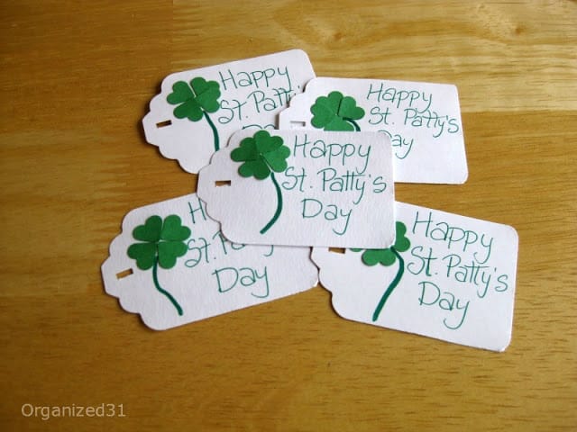 labels with 4 leaf clovers on them and text reading Happy St. Patty's Day