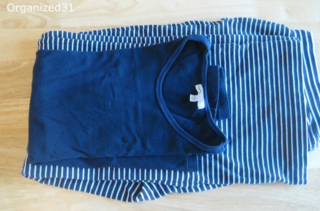 folded pajama shirt and pants