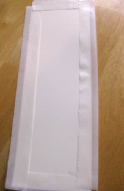 a strip of white cardstock