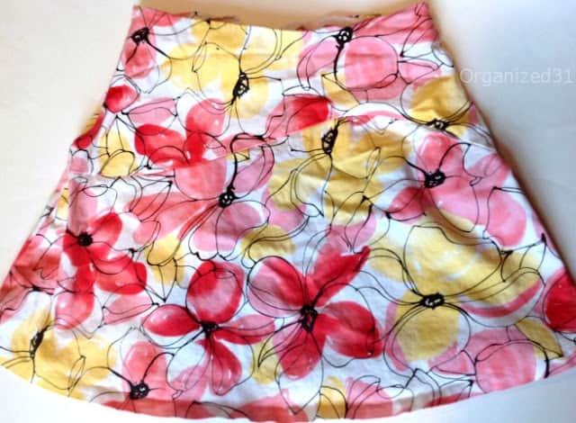 skirt with pink and yellow flowers on it.