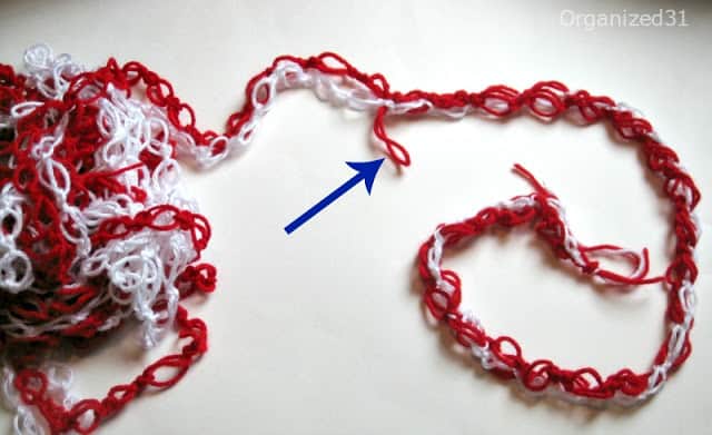 showing how to crochet 2 chains of yarn together