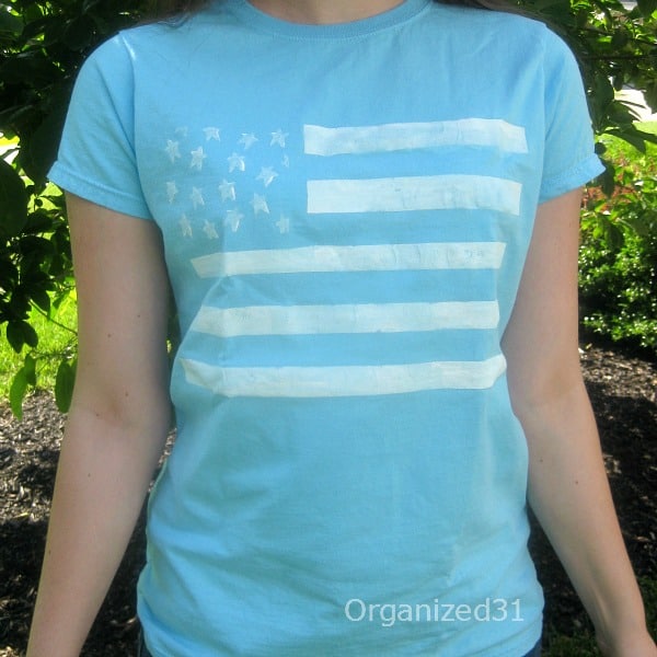 a teen girl wearing a Painted Flag Tee