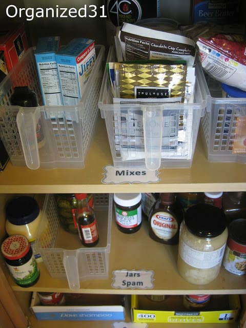 an organized pantry with labels on the shelves
