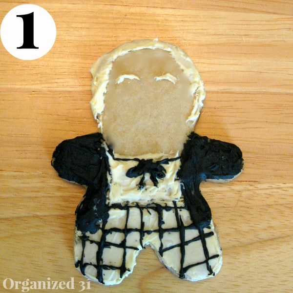 a sugar cookie decorated as Doctor Who - The First Doctor