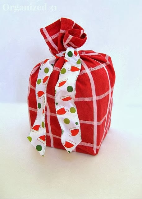 a red and white upcycled fabric gift bag