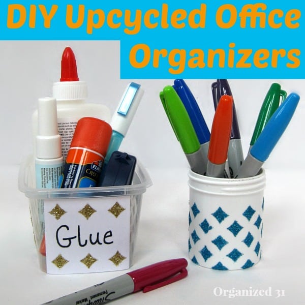 various kinds of glue in a plastic container labelled glue next to pens in a white container decorated with blue diamonds with title text reading DIY Upcycled Office Organizers