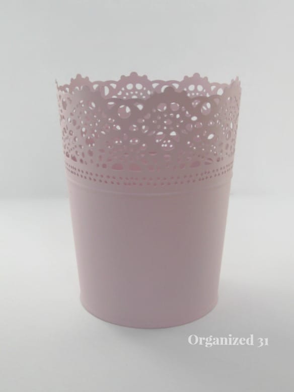a pot wrapped in pink decorative paper