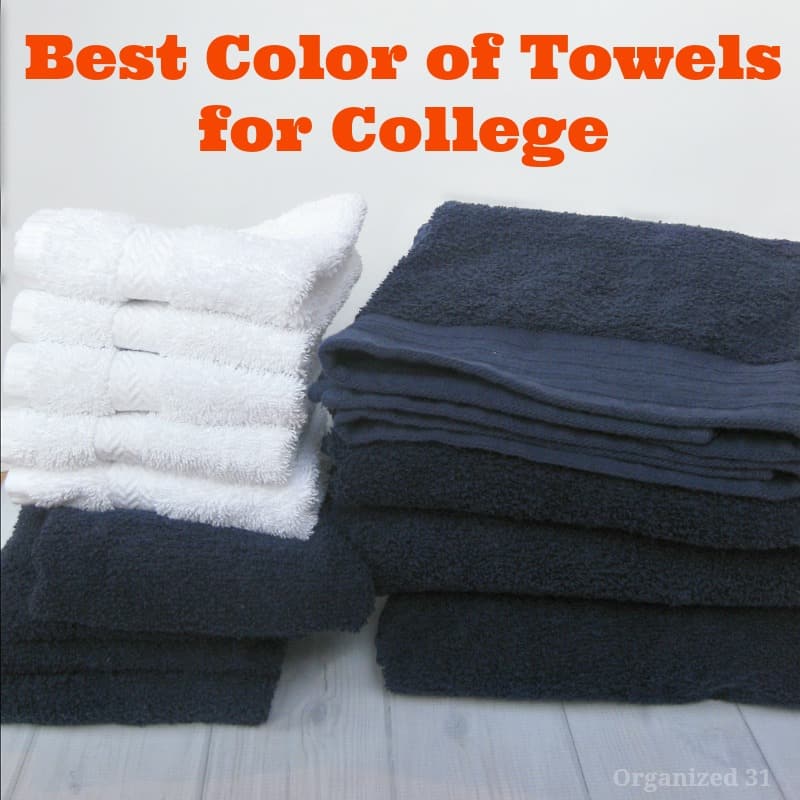 2 stacks of dark blue and white towels.