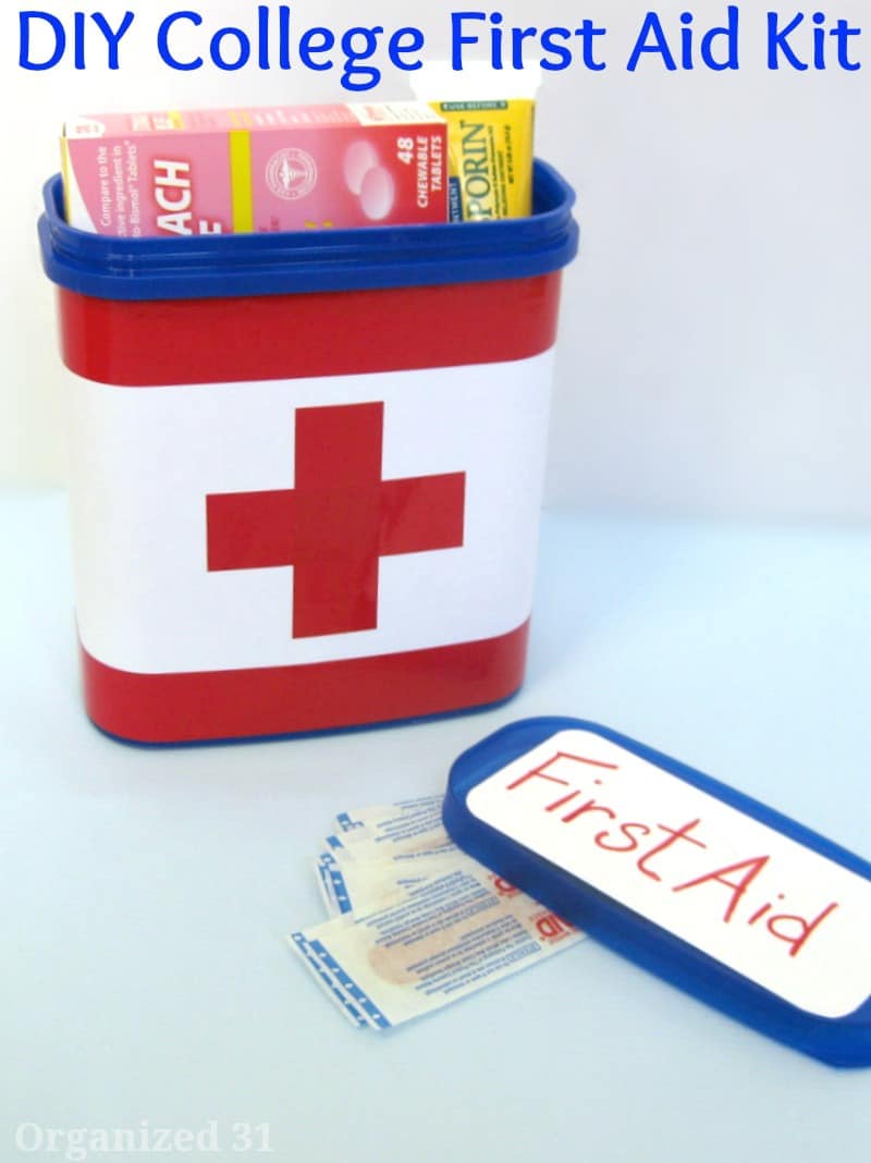 container with red cross on white background with first aid kit items