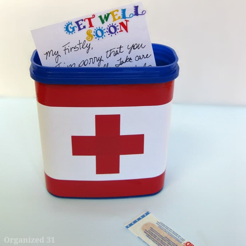 colorful handwritten note in top of first aid box