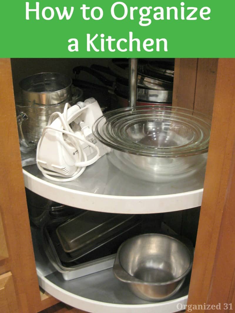 kitchen lazy susan shelves with bowls and mixer