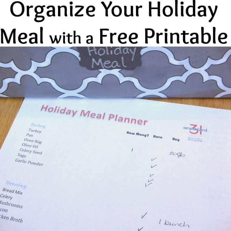 holiday meal planner sheet on table next to grey box.