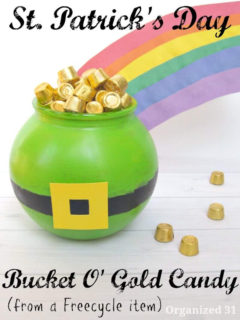 DIY painted bowl in green with belt with gold buckle filled with gold foil candy and rainbow coming out of the bowl