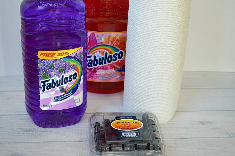 2 bottles of Fabuloso cleaner and roll paper towels