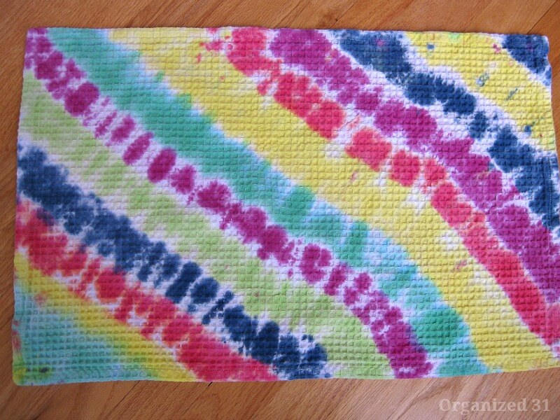 overhead view of tie dyed towels with wavey striped pattern