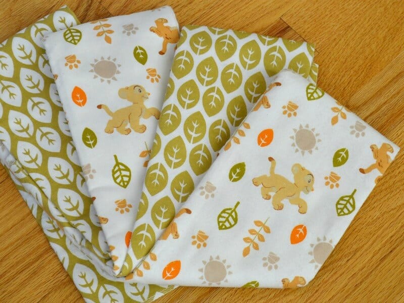2 coordinating baby blankets in greens browns and orange