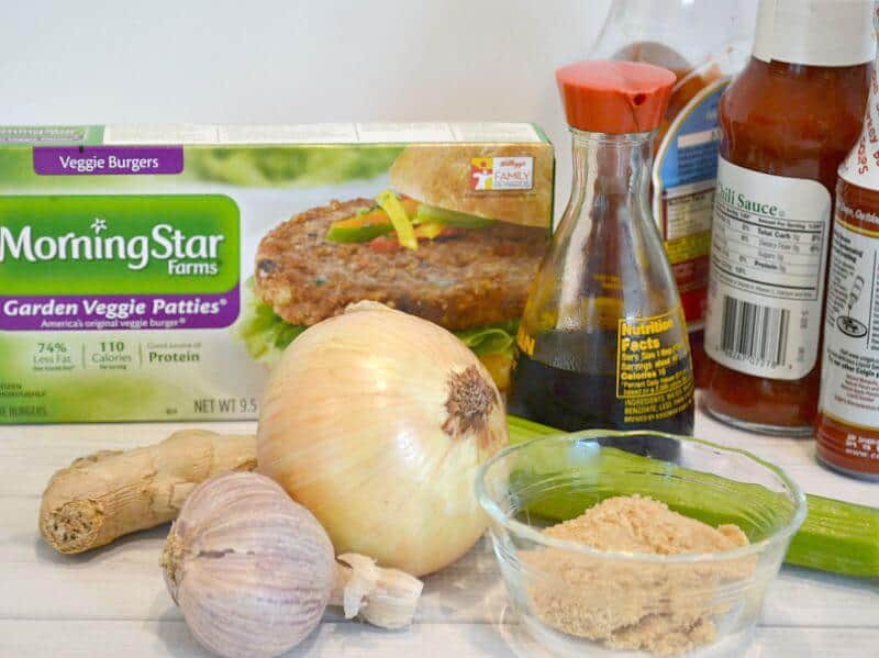 box of veggie patties with bottles, onion, garlic, ginger and bowl of brown sugar
