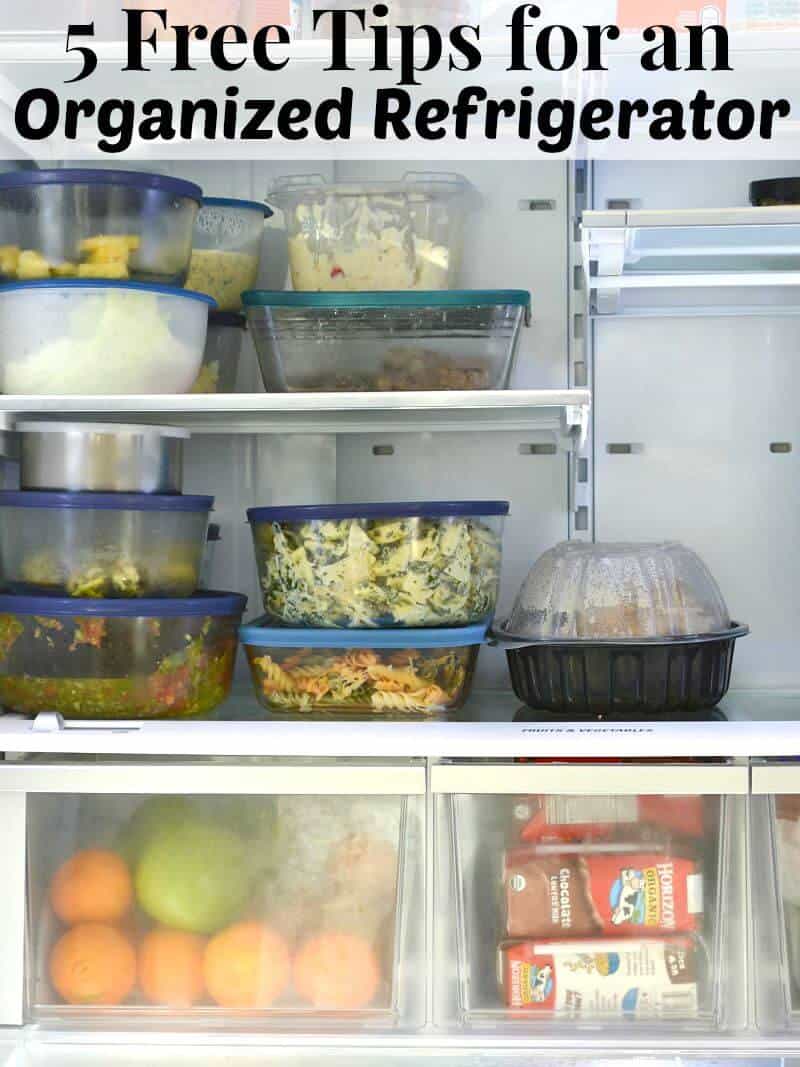 food containers neatly stacked on refrigerator shelves and items in fridge drawers