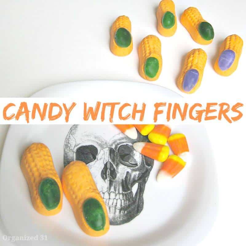 Halloween candy on white plate with skull image and black sign that says "witch fingers"