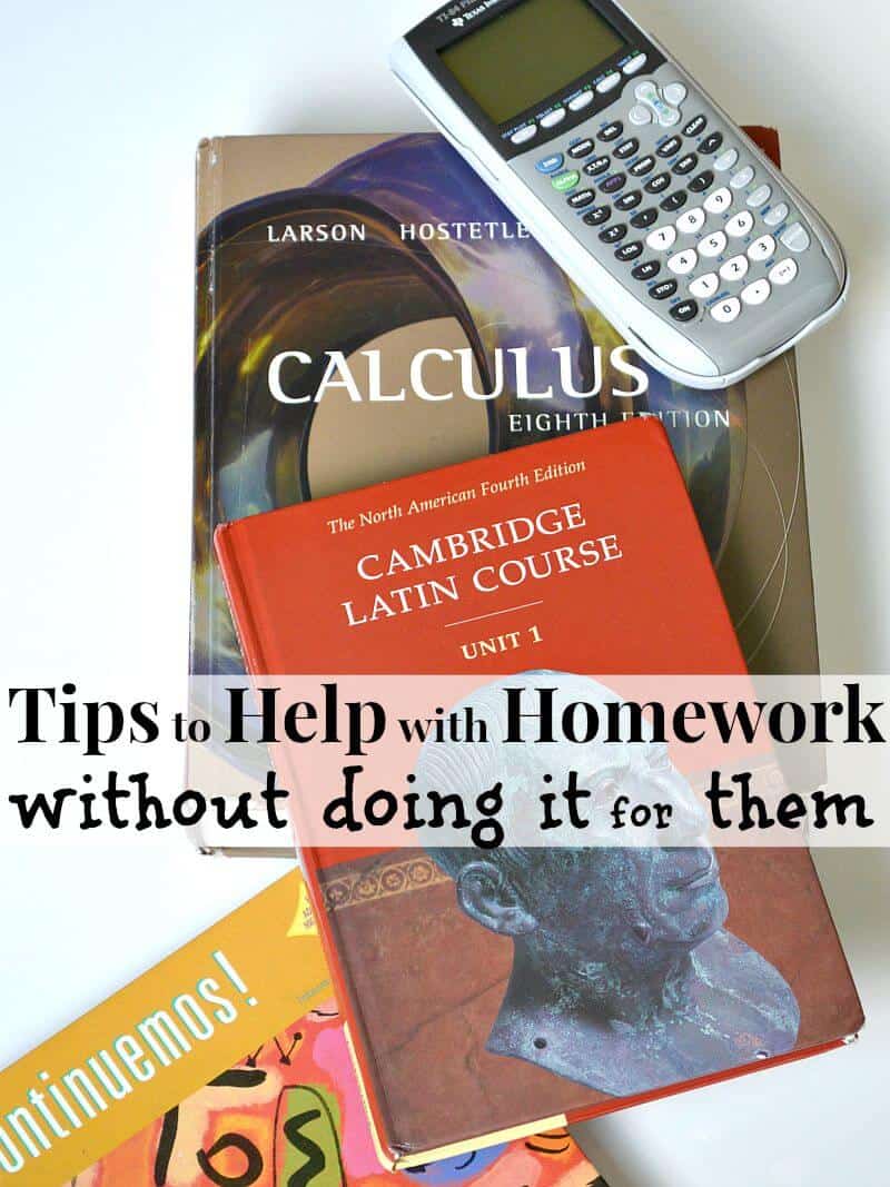 text books with calculator on white table
