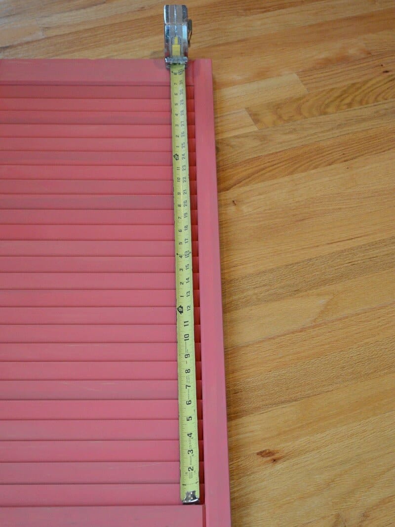 yellow measuring tape on orange shutter