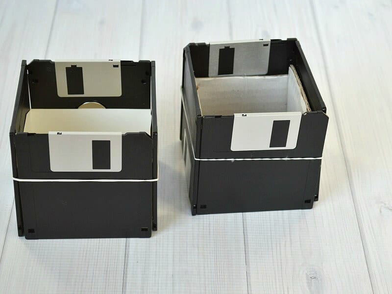 2 diskette boxes with rubber bands aroudn each