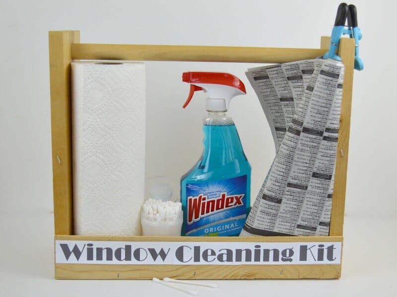 close up of wood window cleaning kit