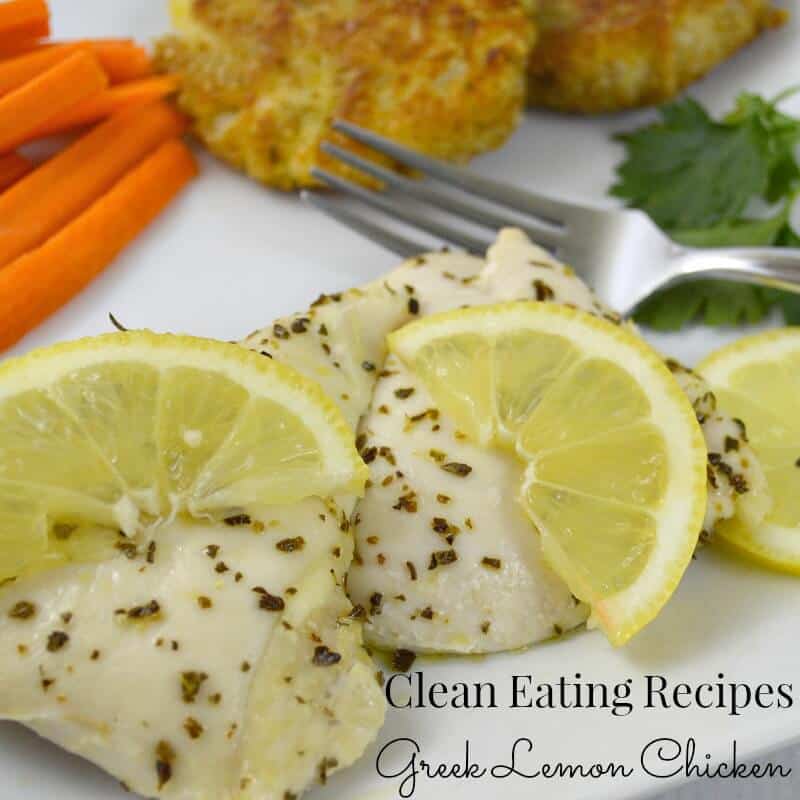 chicken breast with spices and lemon slices and carrots and potato pancakes in background with title text reading Clean Eating Recipes Greek Lemon Chicken