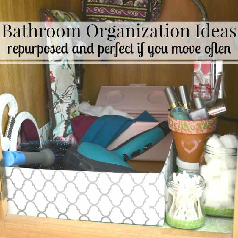box holding organized supplies in bathroom cabinet with title text overlay reading Bathroom Organization Ideas repurposed and perfect if you move often