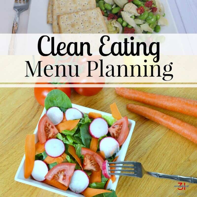 square white bowl of colorful salad with fork, carrots and tomato on table next to the bowl with title text overlay reading Clean Eating Menu Planning