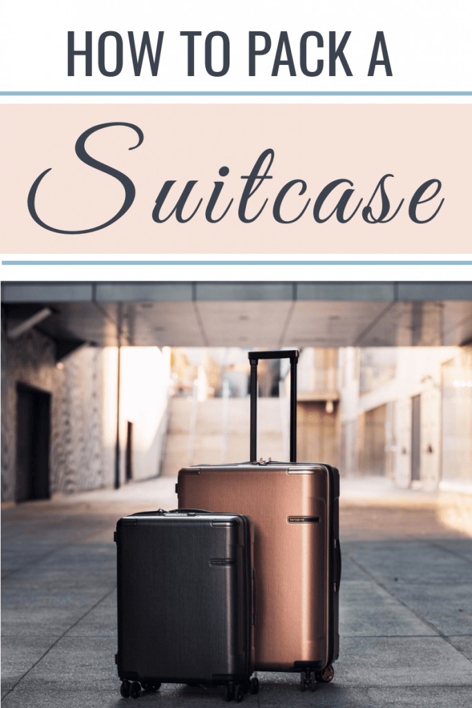2 suitcases on sidewalk