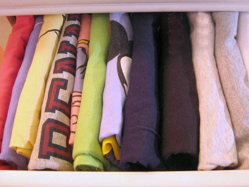 overhead view of folded tee-shirts in drawer