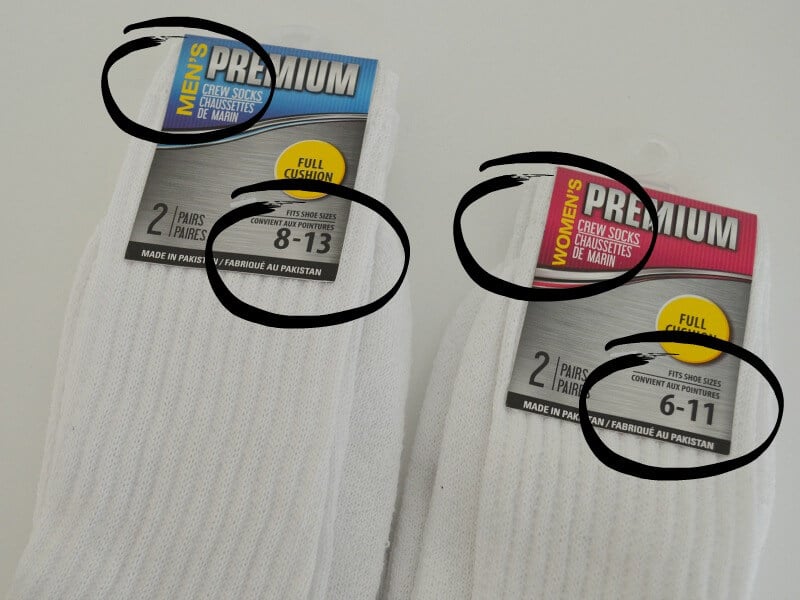 2 packs of white socks with sizes circled