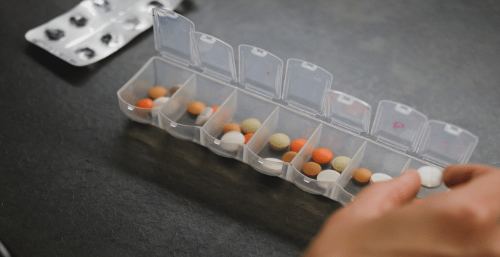 pill box organizer filled with pills