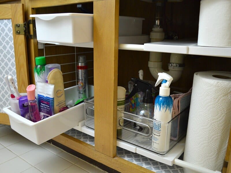 Cabinet organizing shelf with pull out drawers