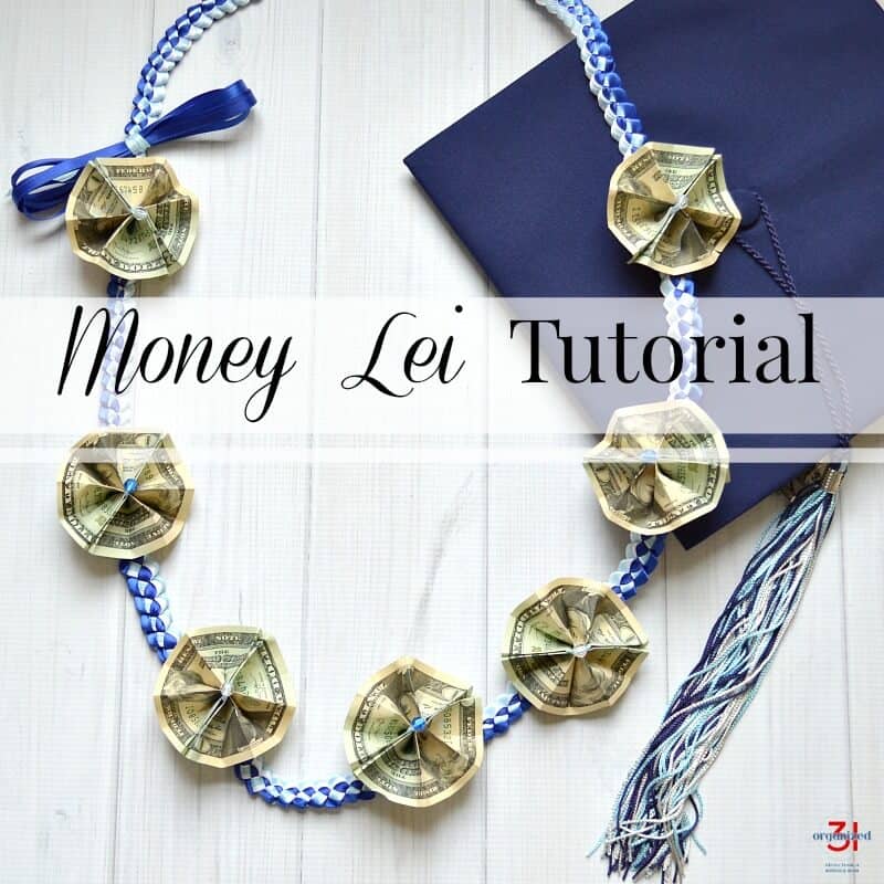 overhead view of money lei and graduation mortar board with text overlay reading Money Lei Tutorial
