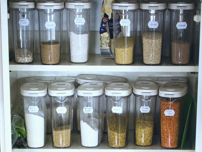 canisters of food in cabinet