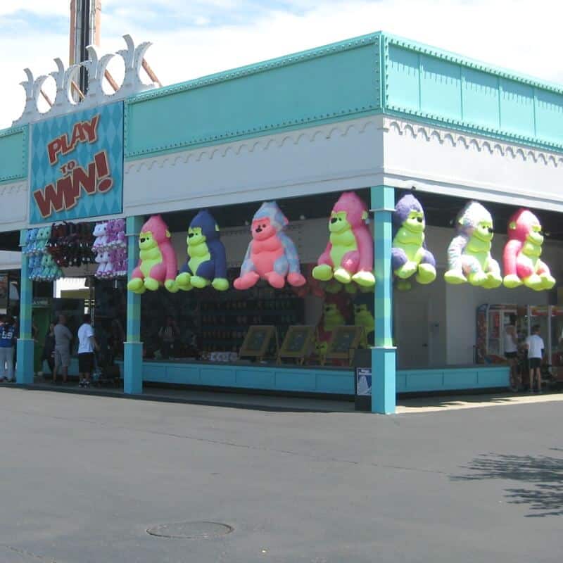 blue game booth with giant stuffed gorillas
