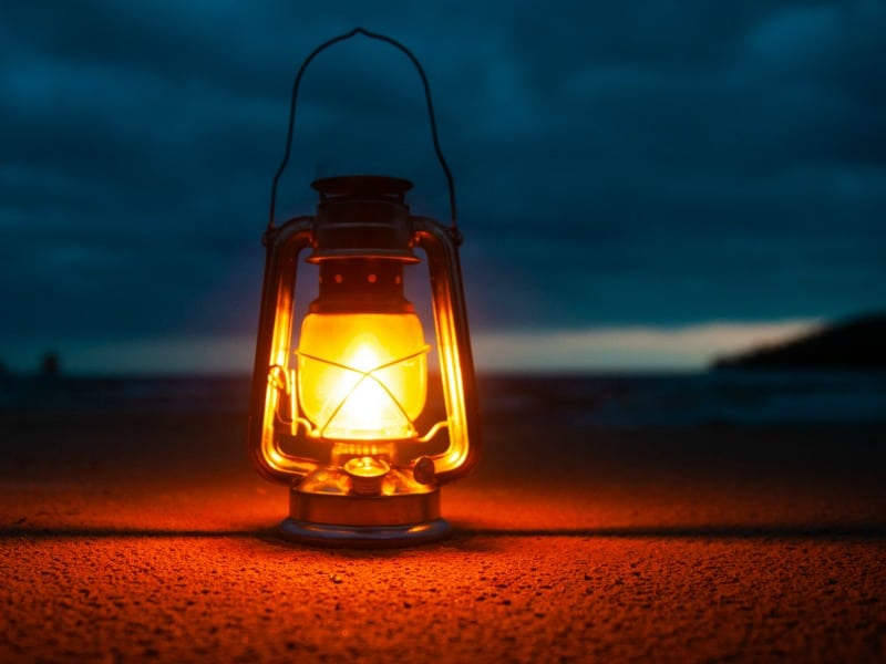 lit lantern at dusk
