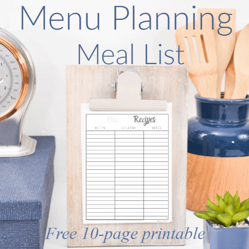 clipboard with meal list with kitchen utensils