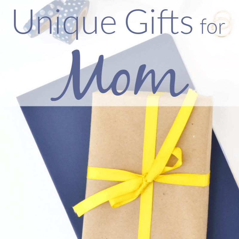 Brown paper wrapped gift with yellow ribbon on navy blue wrapped gift with text overlay