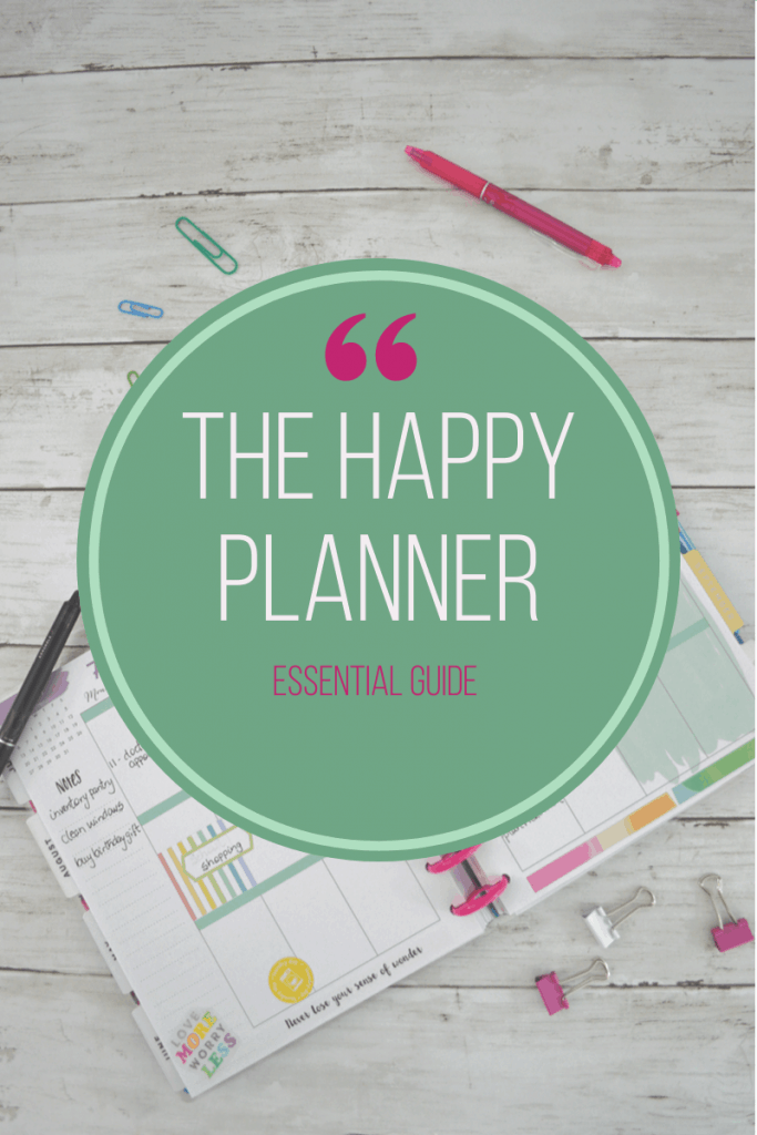 happy planner calendar with paper clips and pens and green circle overlays