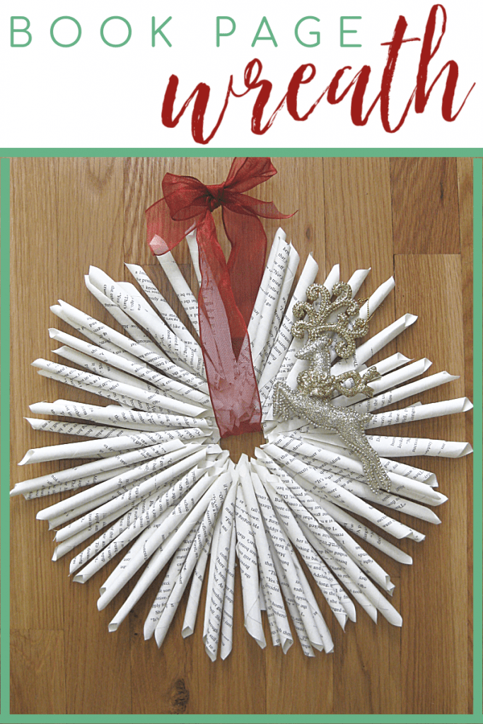 wreath made from book pages on wood table